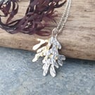 Silver and brass seaweed pendant