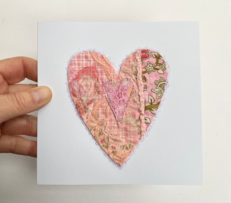 Up-cycled handmade fabric embroidered heart card. 