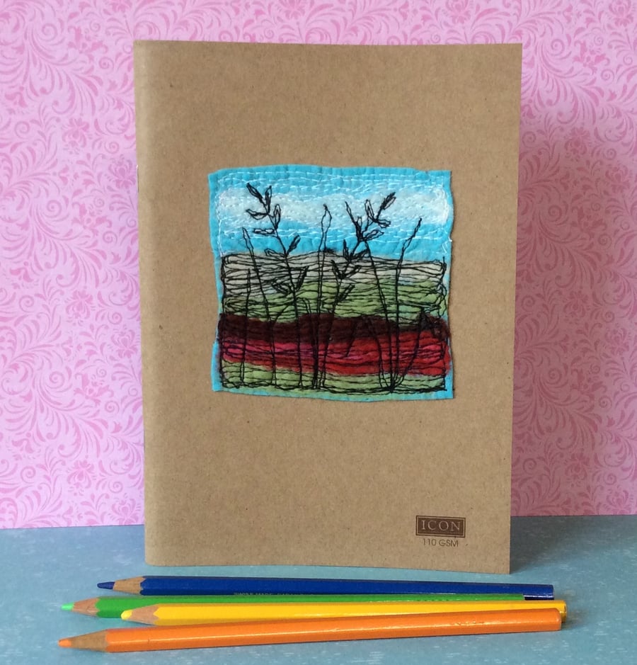 Silhouette landscape embroidered sketchbook. 