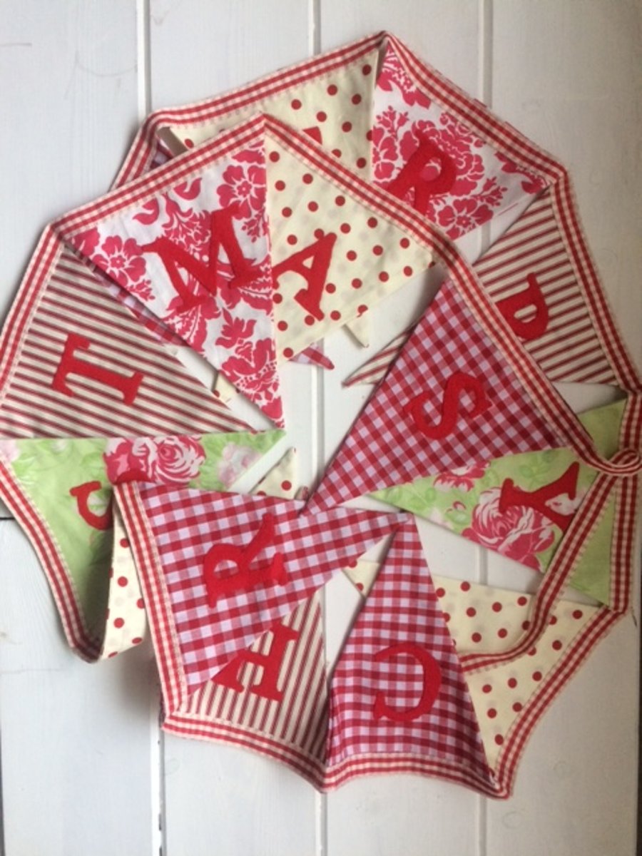Merry Christmas fabric bunting with hand-stitched lettering