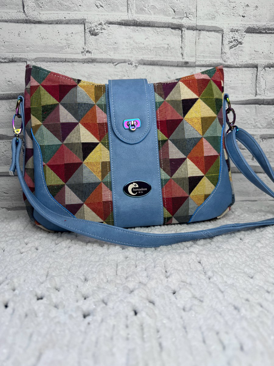 Blue faux leather & multi coloured tabestry crossbody bag