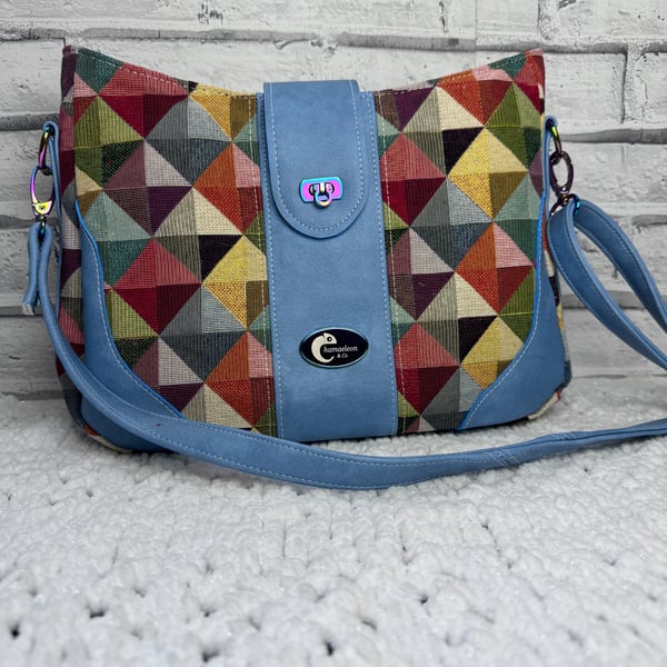 Blue faux leather & multi coloured tabestry crossbody bag