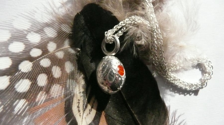 Easter egg pendant in solid silver set with a 3mm gemstone