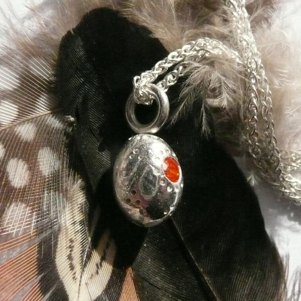 Easter egg pendant in solid silver set with a 3mm gemstone