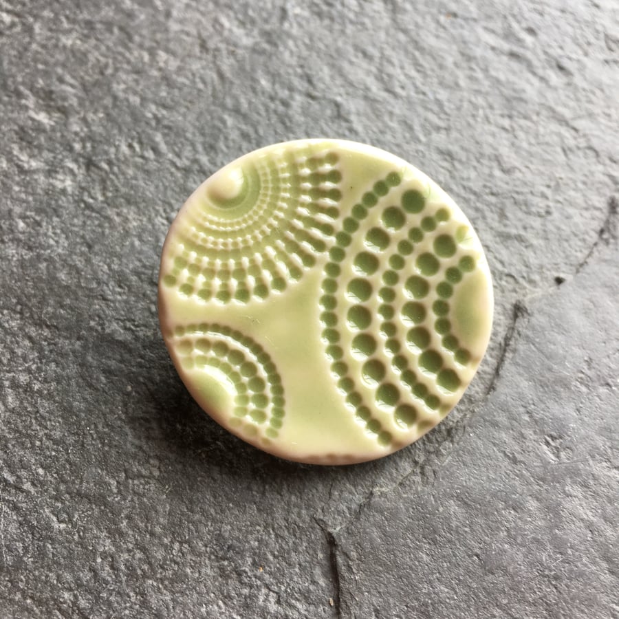 Porcelain brooch Spotty circles pale green glaze The Porcelain Menagerie