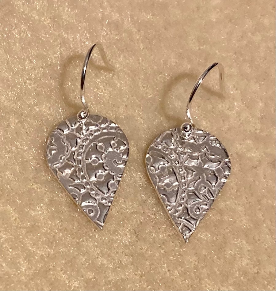 Pure silver inverted teardrop earrings with beautiful patterns 