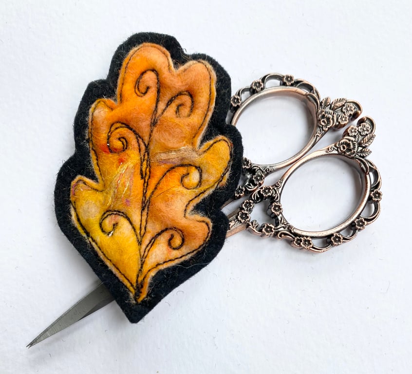 Embroidered oak leaf brooch pin of badge. 