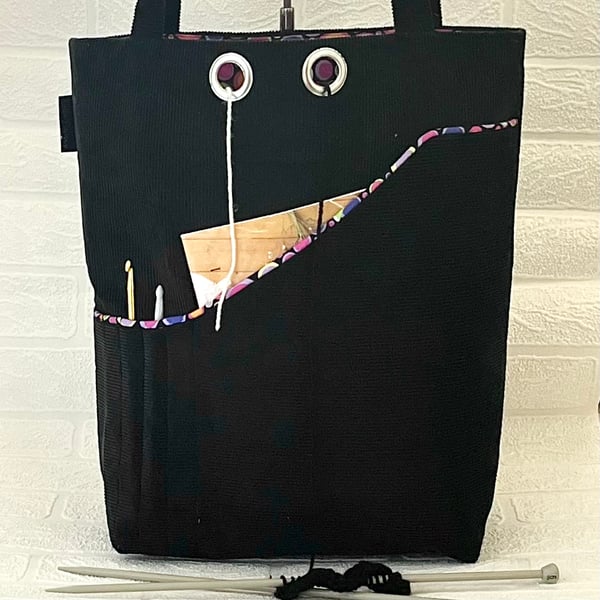 Knitting project bag, black cord with pink bubble lining 