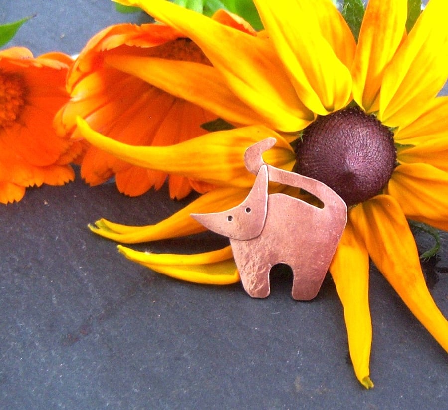 Cat brooch in copper