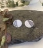 Stud earrings in shite and silver