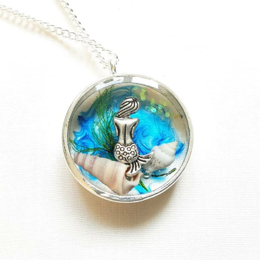 Necklace with inset mermaid underwater scene set in resin