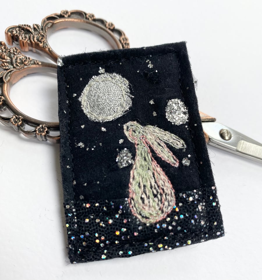 Upcycled moon and hare brooch pin or badge. 