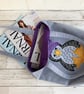 Penguin tote bag in pale blue with a paisley penguin in a purple bobble hat - Image 8