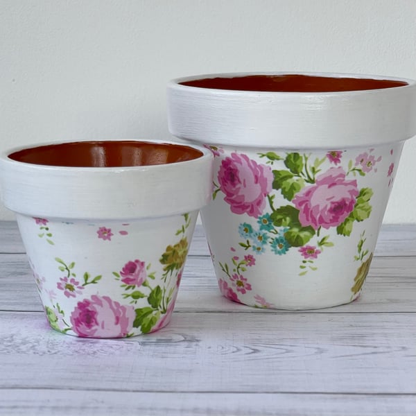 A set of one small and one mini decoupage decorated plant pot