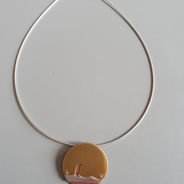 Brass and copper pendant - Penguin on ice 