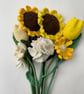 Yellow crochet flower bouquet, sunflowers, daisies, tulips and carnation.