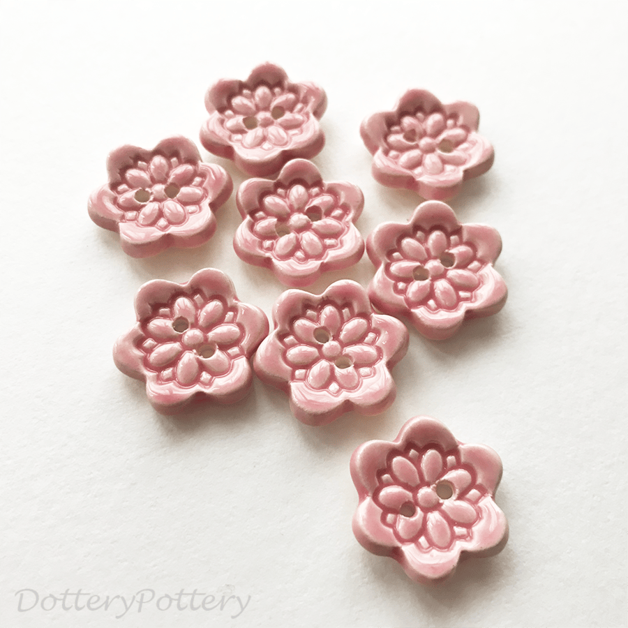 Set of eight little handmade ceramic buttons pink
