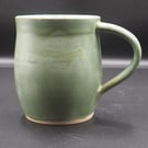 Large stoneware pottery mug finished in a sage green satin glaze