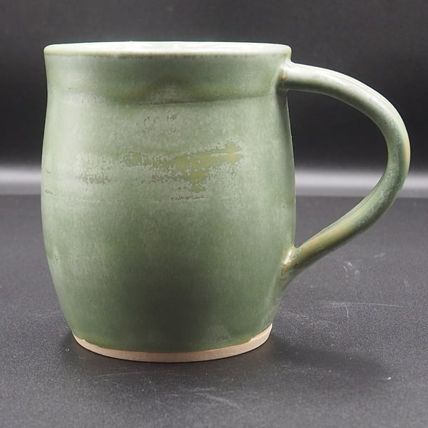 Large stoneware pottery mug finished in a sage green satin glaze