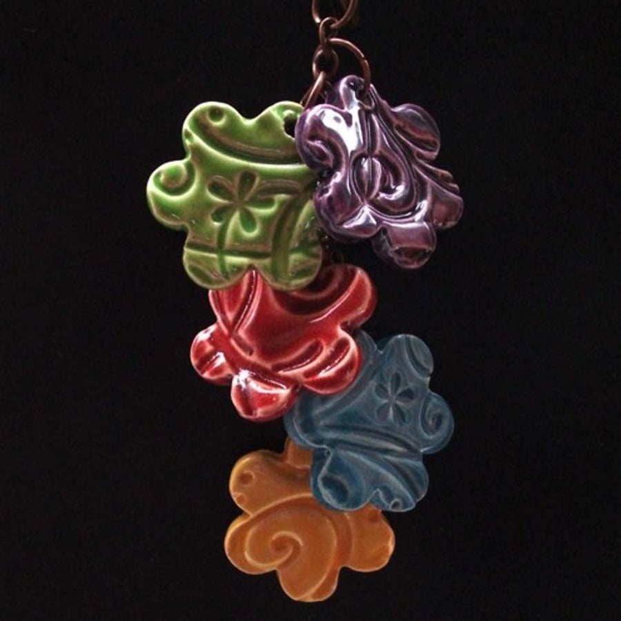 multicoloured ceramic bag charm