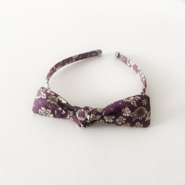 Alice Band in Floral Plum With Bow Embellishment