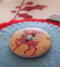 Pair of bauble shaped felt handstitched red and blue Christmas decorations - Image 3