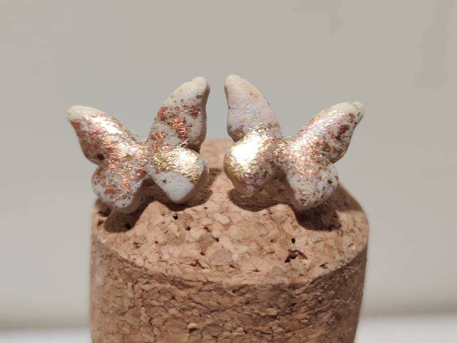 White rainbow micro butterflyearrings 