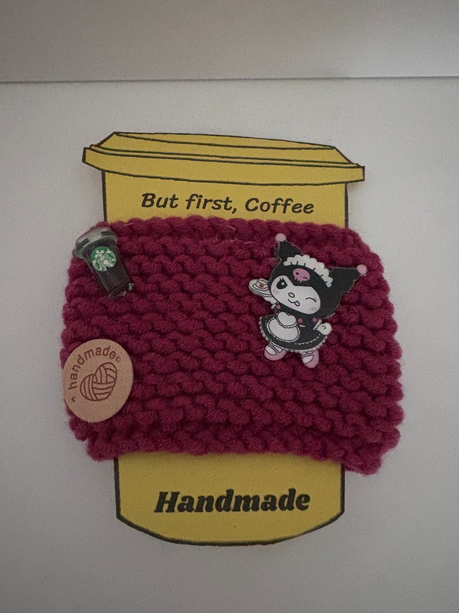 Anime knitted cup cosy. 