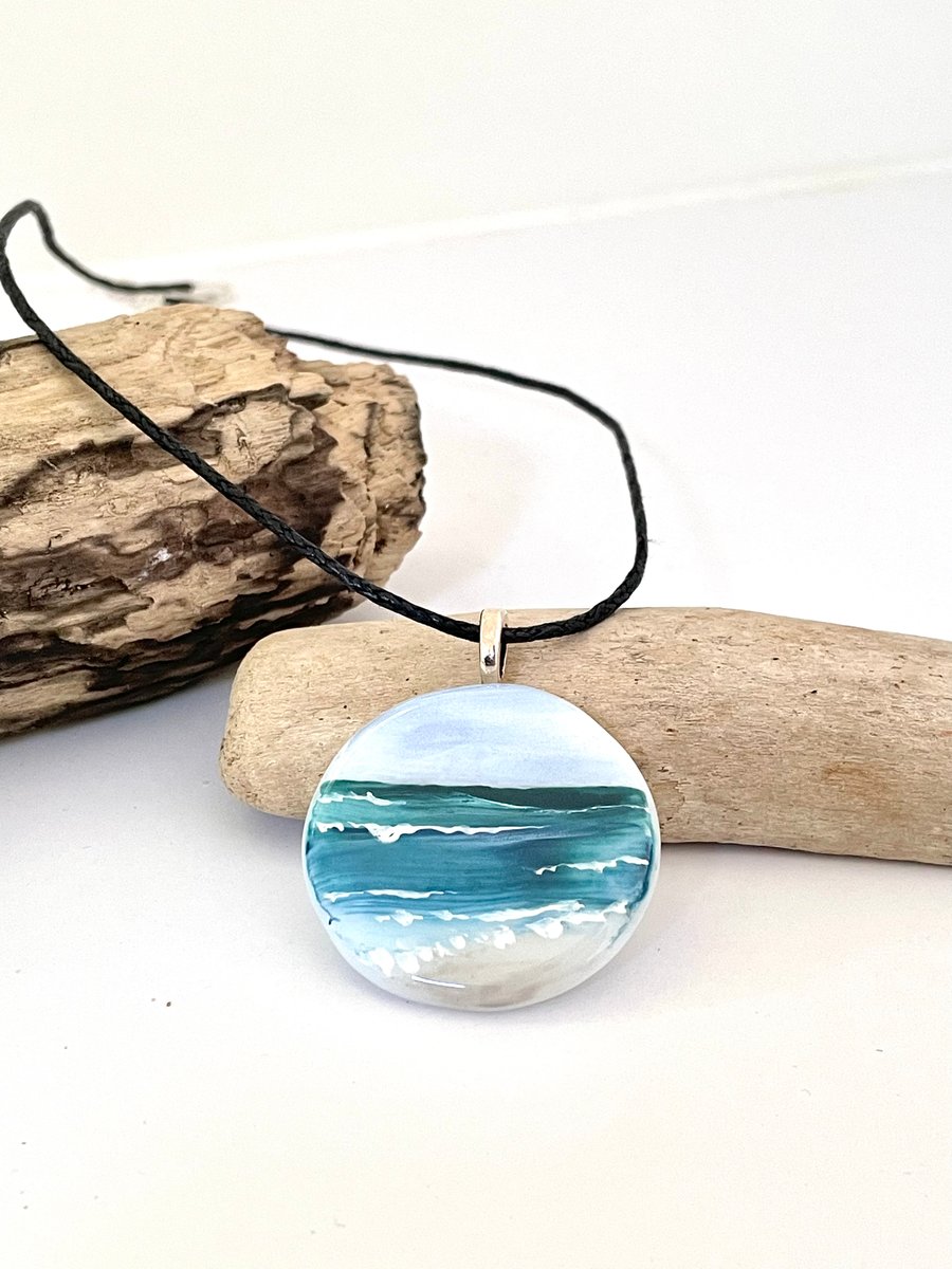 Hand painted enamel & glass round seascape pendant 
