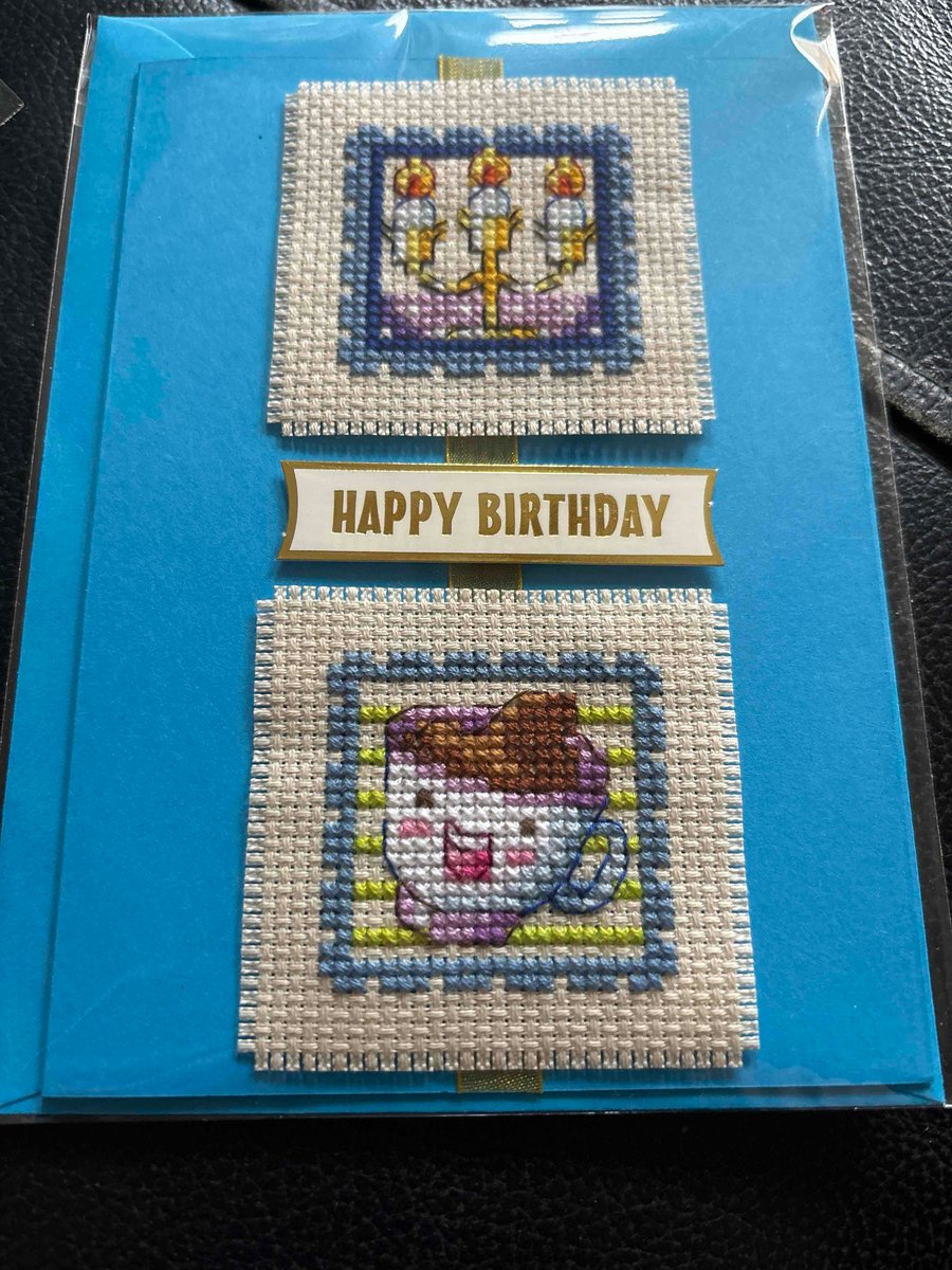 Cross stitched Happy Birthday card. Beauty & the Breast cup and candlestick 