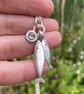 Sterling silver and blue topaz fish pendant with optional chain