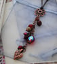 Red Copper Daisy Necklace - Image 1
