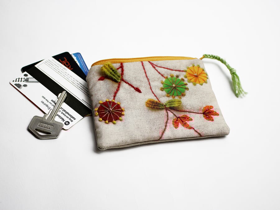 Oatmeal card and key purse with embroidered almond blossom design