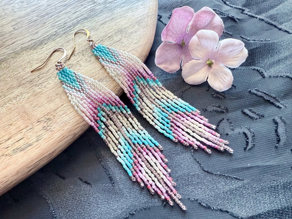 Handwoven beaded fringe earrings in a soft pastel chevron design