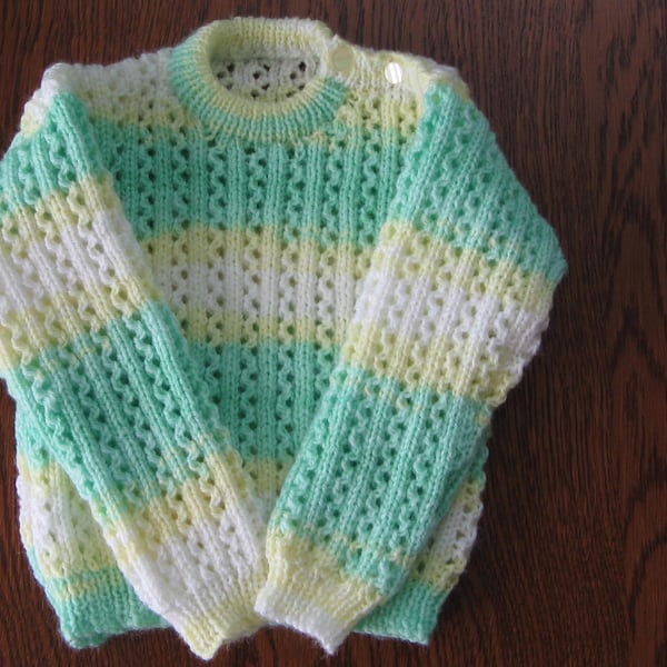 Hand Knitted baby jumper    chest 22   56cm