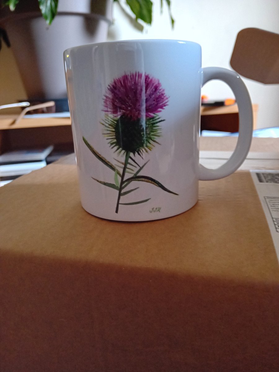 Scottish thistle Mugs with a mixed media design of a thistle. Dishwasher safe!