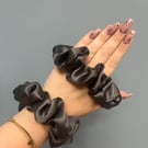 2 pure silk scrunchies. Colour dark grey