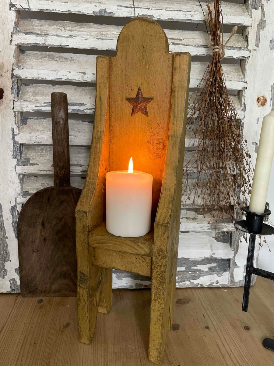 A beautiful primitive handmade pouting chair