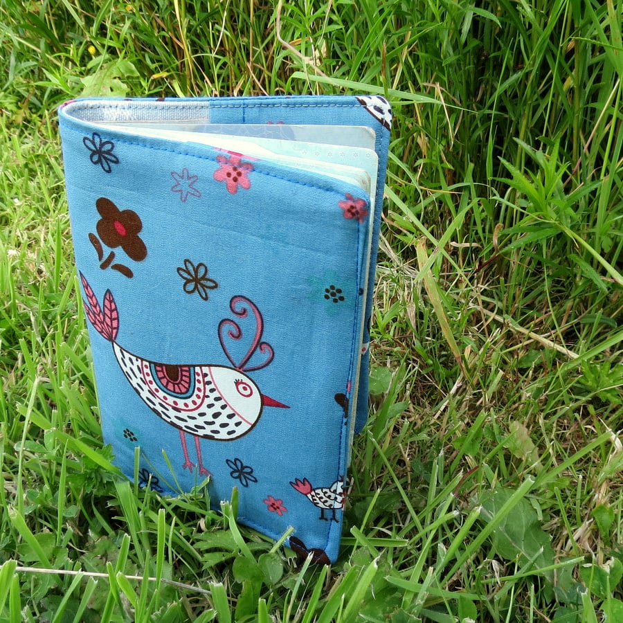 Chickens..  A fabric passport sleeve with a whimsical chickens 