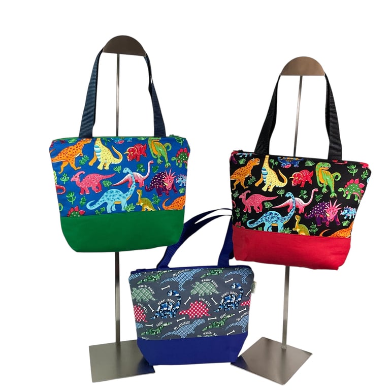 Childrens dinosaur toiletries bag with wipe clean lining and handles, boys wash 