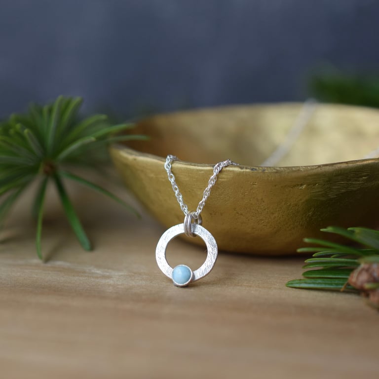 Sterling silver circle pendant with larimar gemstone