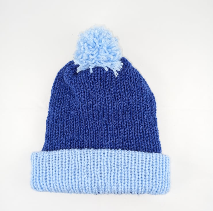 Blue and white bobble hat 2025