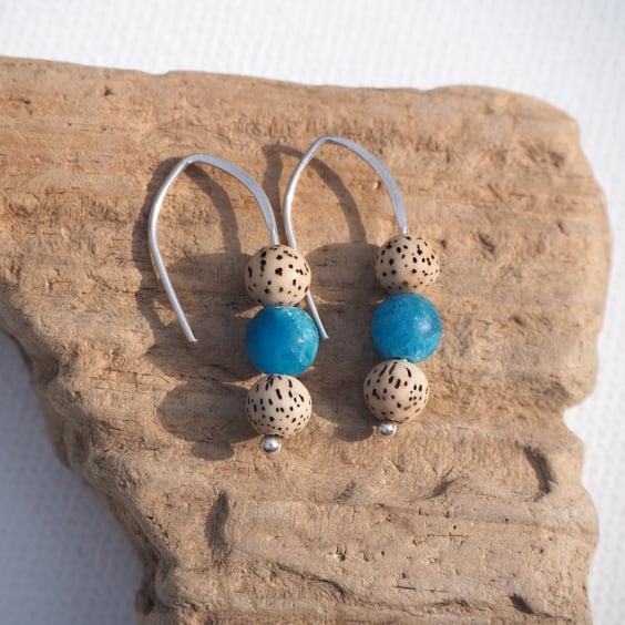 Earrings, silver Lotus seed drop earrings.
