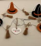 Handmade crochet Witches hat and broomstick bunting  - Image 1