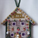 Handmade Christmas house wall decoration.