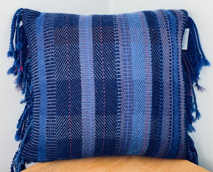 Hand woven 100% wool cushion in a range of brilliant blues