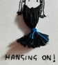 Embroidery hoop with motivational quote of a girl “hanging on” upside down  - Image 5