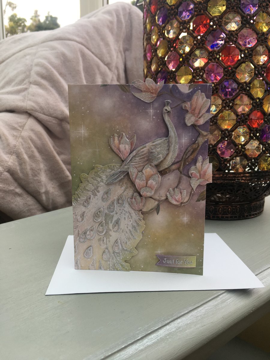 Ethereal white peacock birthday card.