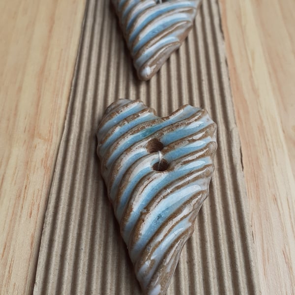 Set of 2 large blue and brown heart buttons