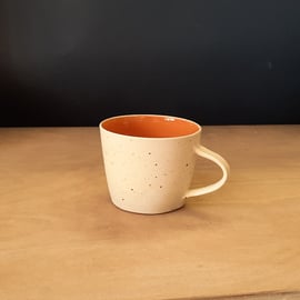 Hand made burnt orange and cream stoneware ceramic mug cup